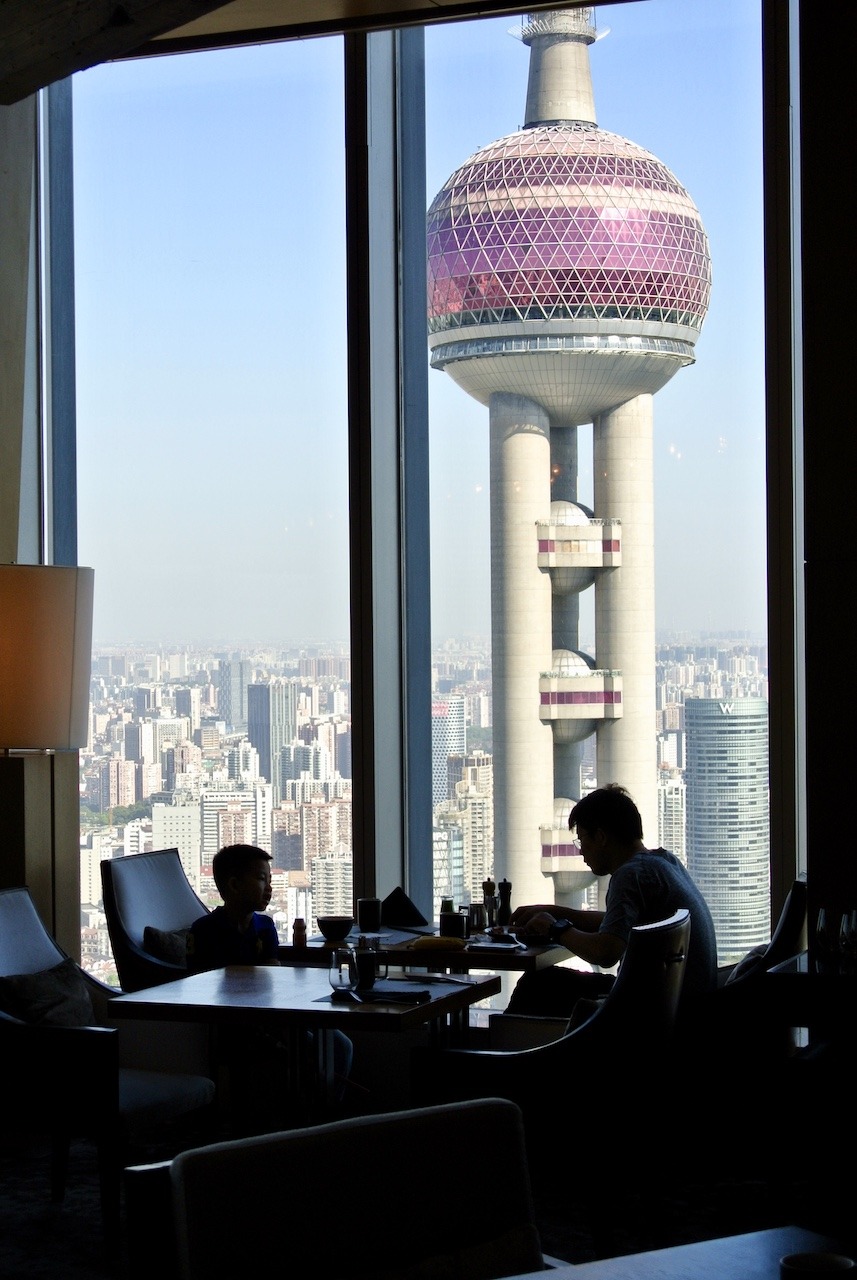 Sena restaurant seating with Oriental Pearl in background