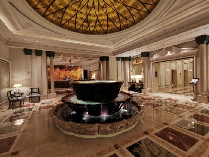 a large fountain in a large room