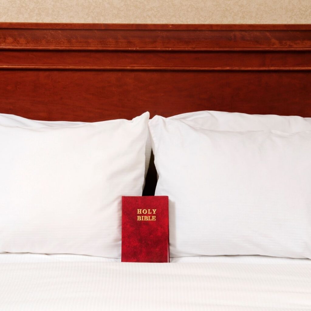 Why do hotels have bibles in them. Bible in hotel room bed