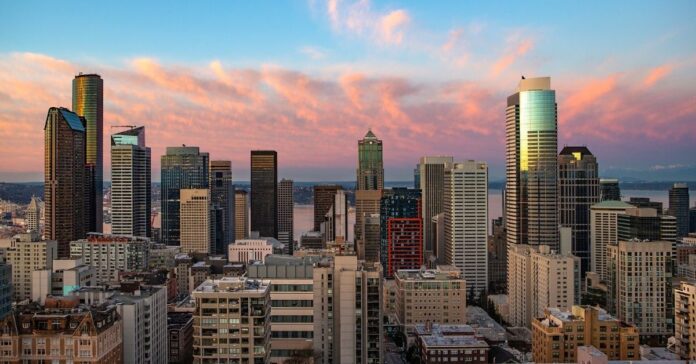 a city skyline with many tall buildings