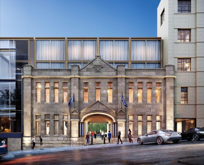 a building with people walking by it