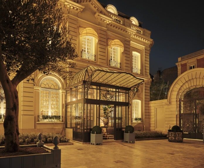 a building with a glass door and a courtyard