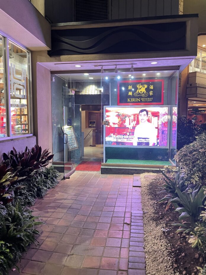 a store front with a sign on the front