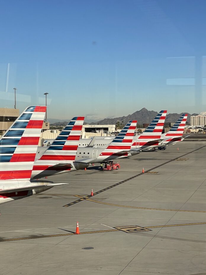 airplanes parked on a runway