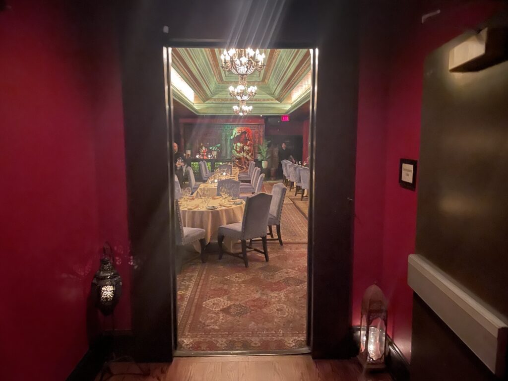 a doorway to a room with a table set up