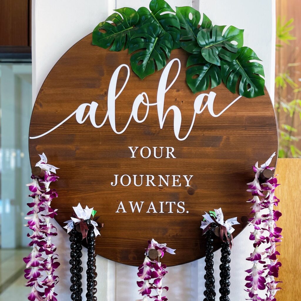 welcome sign with lei at the Four Seasons Oahu at Ko Olina