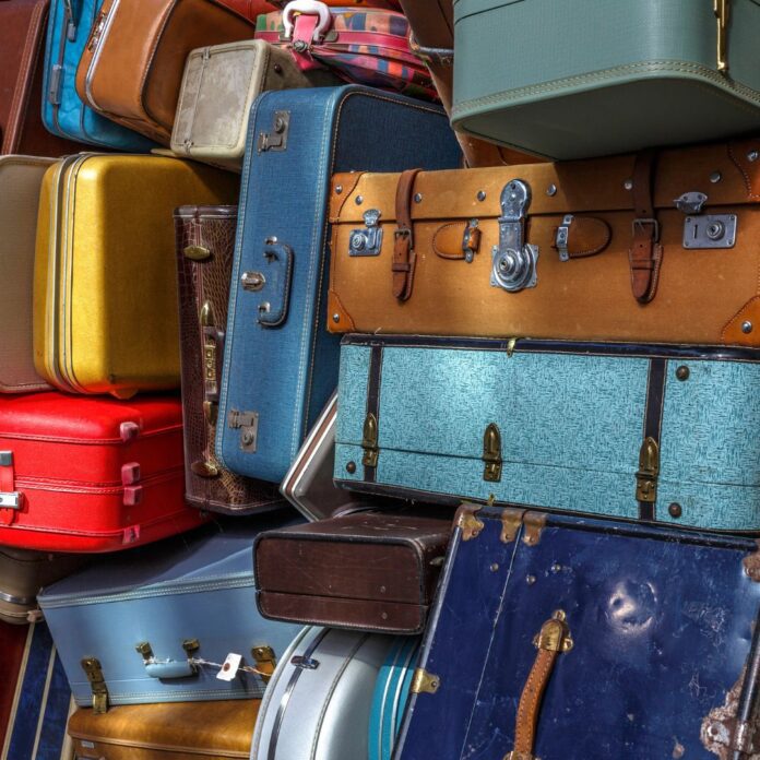 a pile of luggage in a pile