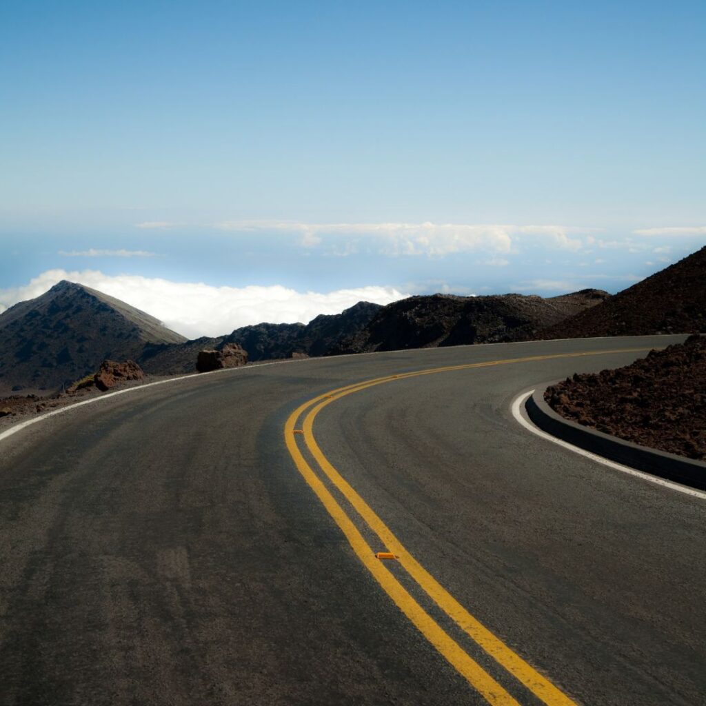 a road with a yellow line on the side