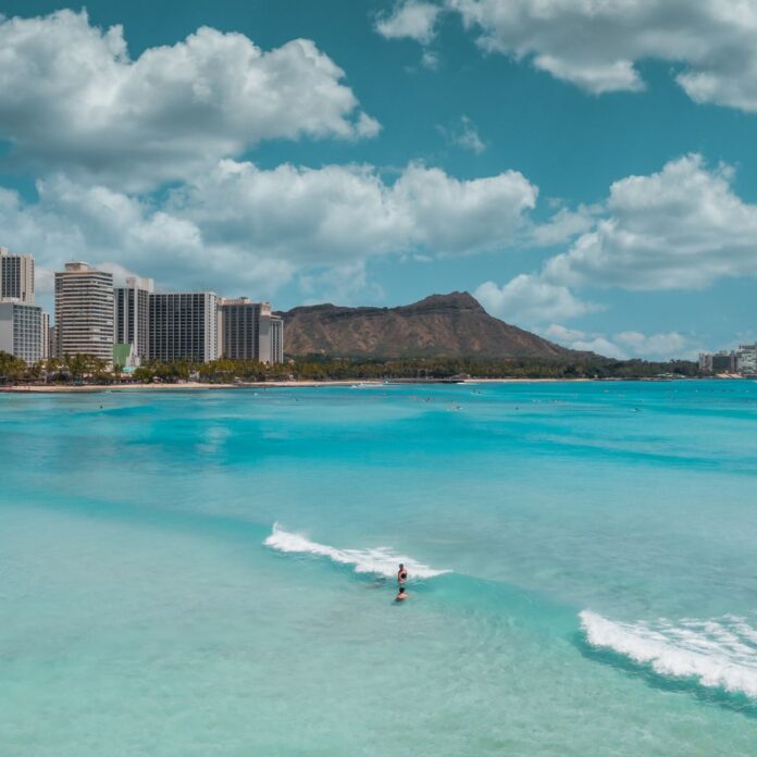 a person on a surfboard in the water