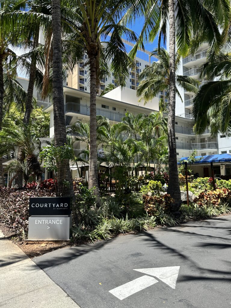 a sign in front of a building