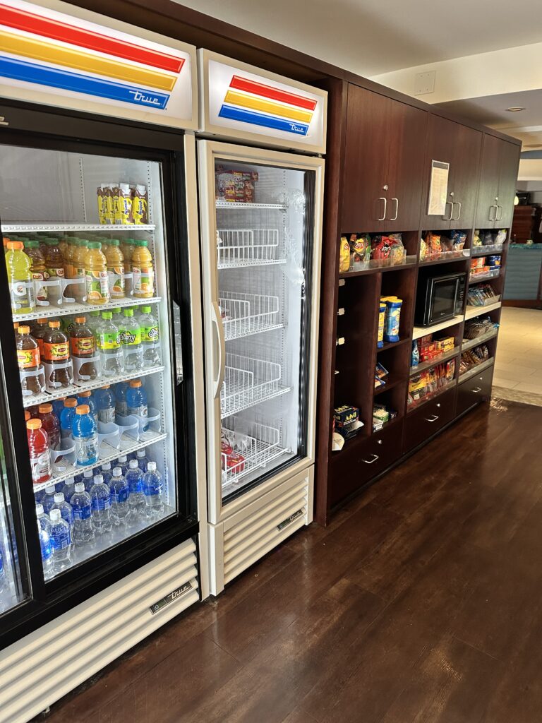 a refrigerators with drinks and snacks