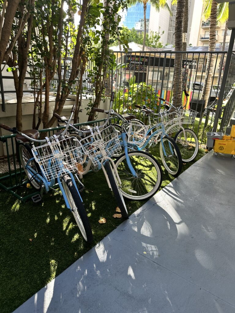 a group of bicycles parked on grass
