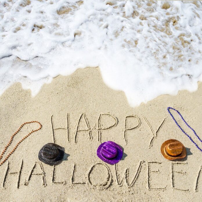 a beach with a few hats on it