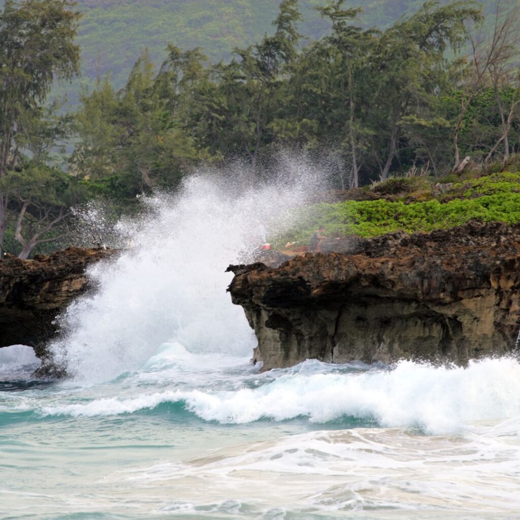 waves crashing waves on a rocky cliff