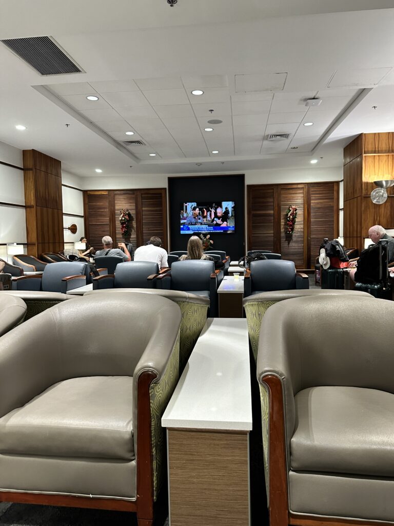 a group of people sitting in chairs in a room