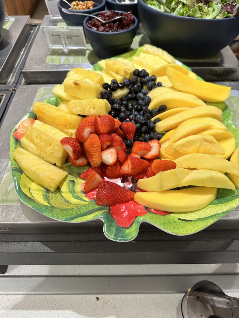 a plate of fruit on a counter