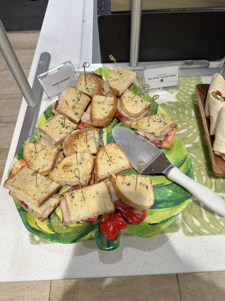 a plate of sandwiches with a knife