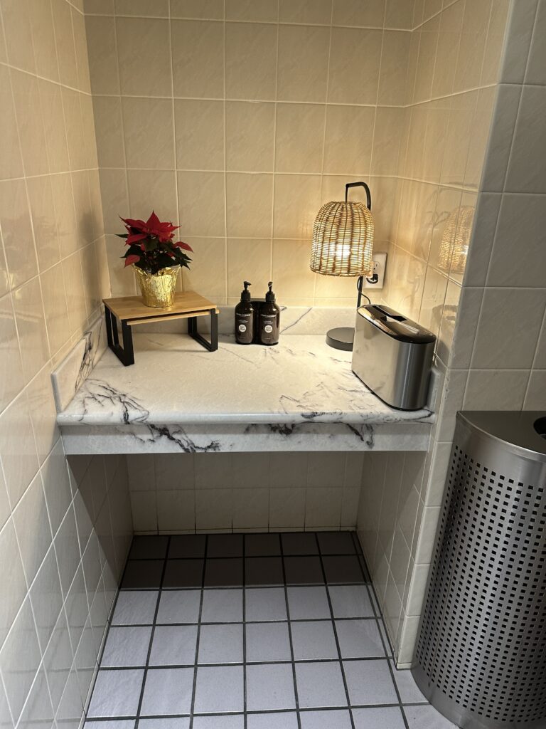 a bathroom with a marble counter top