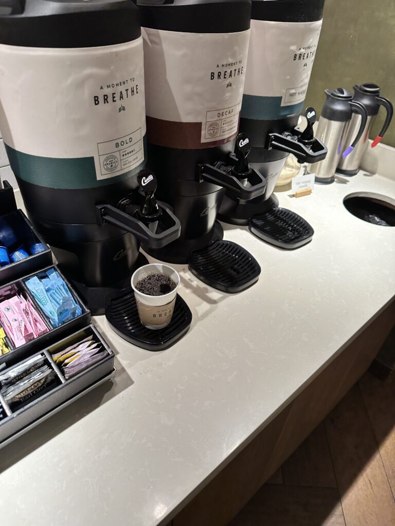 a group of coffee machines on a counter