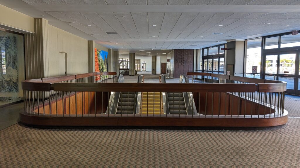 a building with escalators and stairs