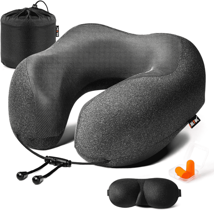 a black neck pillow with a black bag and orange pills