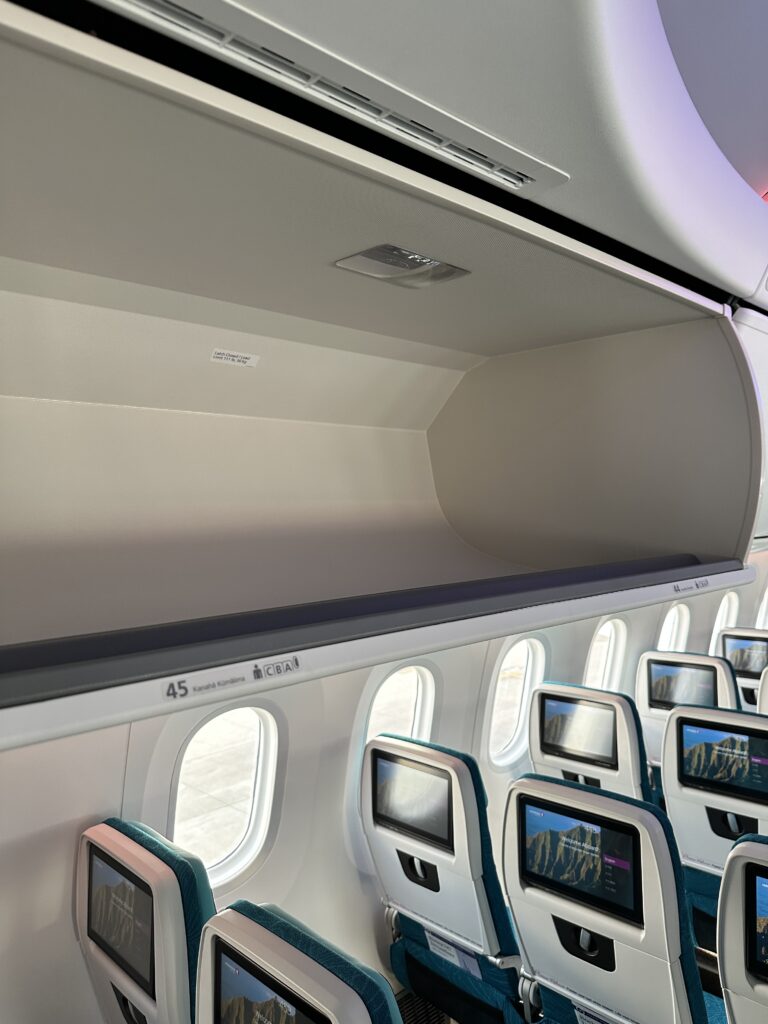 an airplane with seats and a screen