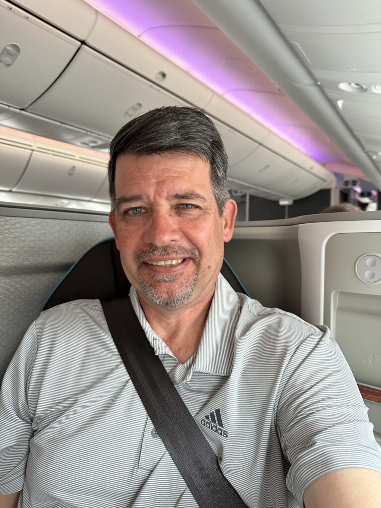 a man sitting in an airplane